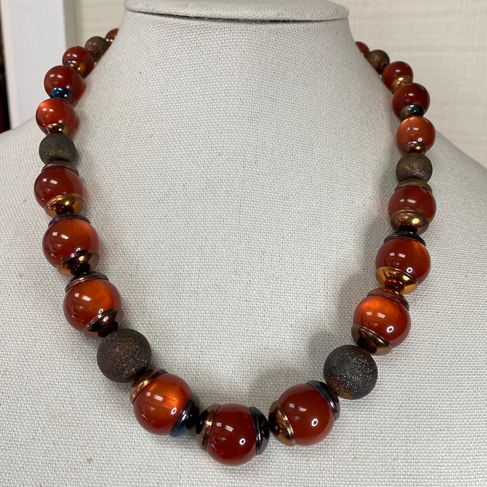 Chunky amber orange bead necklace with interesting patina